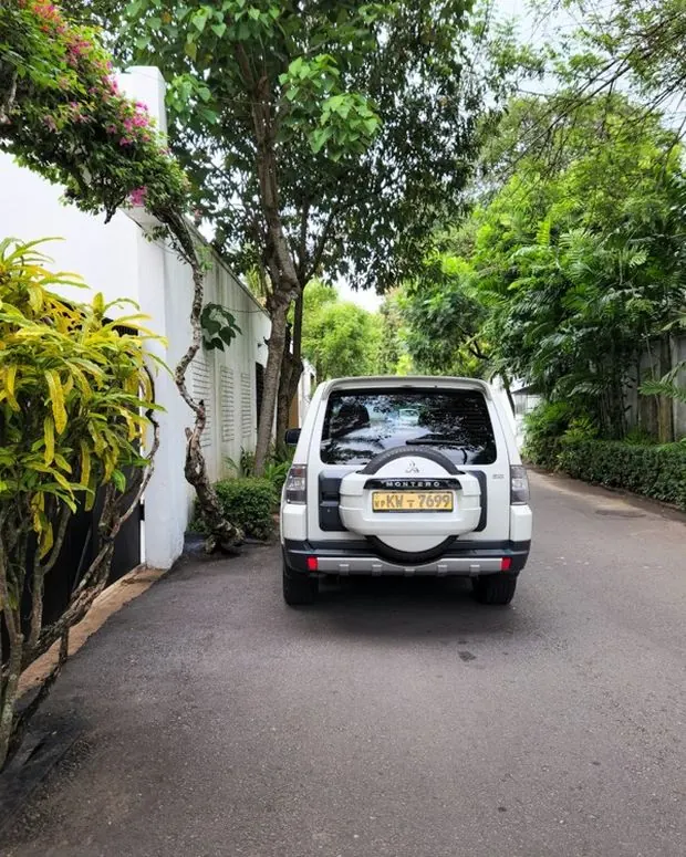 A vehicle on a quiet lane at an offsite venue